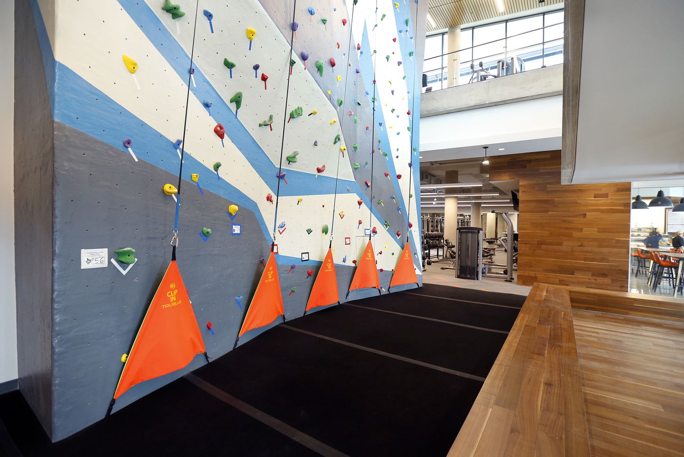 A two-story climbing wall is part of the fitness center.