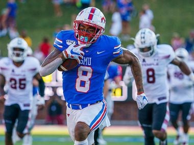 SMU wide receiver Reggie Roberson Jr. (8) races past Temple cornerback Harrison Hand (23) on a 60-yard touchdown during the second half of an NCAA football game at Ford Stadium on Saturday, Oct. 19, 2019, in Dallas.