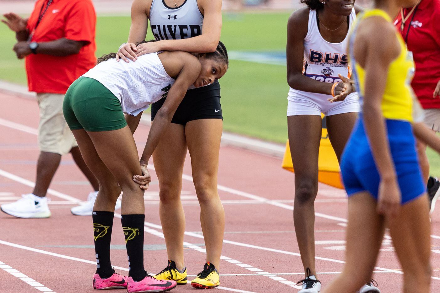 Lauren Lewis of Prosper catches her breath after the girls’ 400-meter dash at the UIL Track...