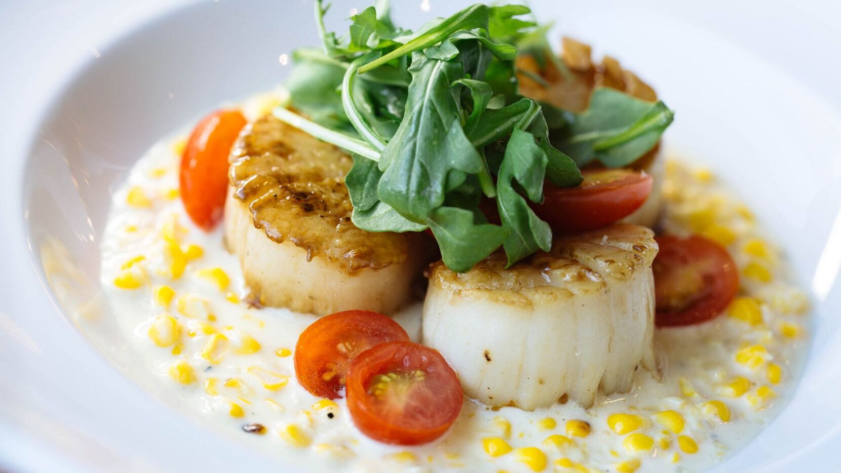 Sugarbacon Proper Kitchen sells dishes like Gulf scallops (pictured) and shrimp and grits.