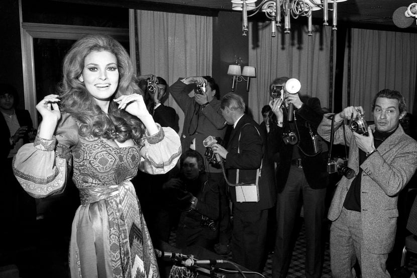 Raquel Welch poses for photographers in Paris on Jan. 15, 1970. Welch, whose emergence from...