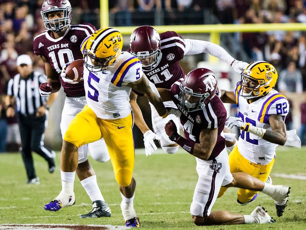 LSU running back Derrius Guice (5) breaks through the Texas A&M defense on a 45-yard touchdown run during the first quarter of an NCAA football game at Kyle Field on Thursday, Nov. 24, 2016, in College Station, Texas (Smiley N. Pool/The Dallas Morning News)