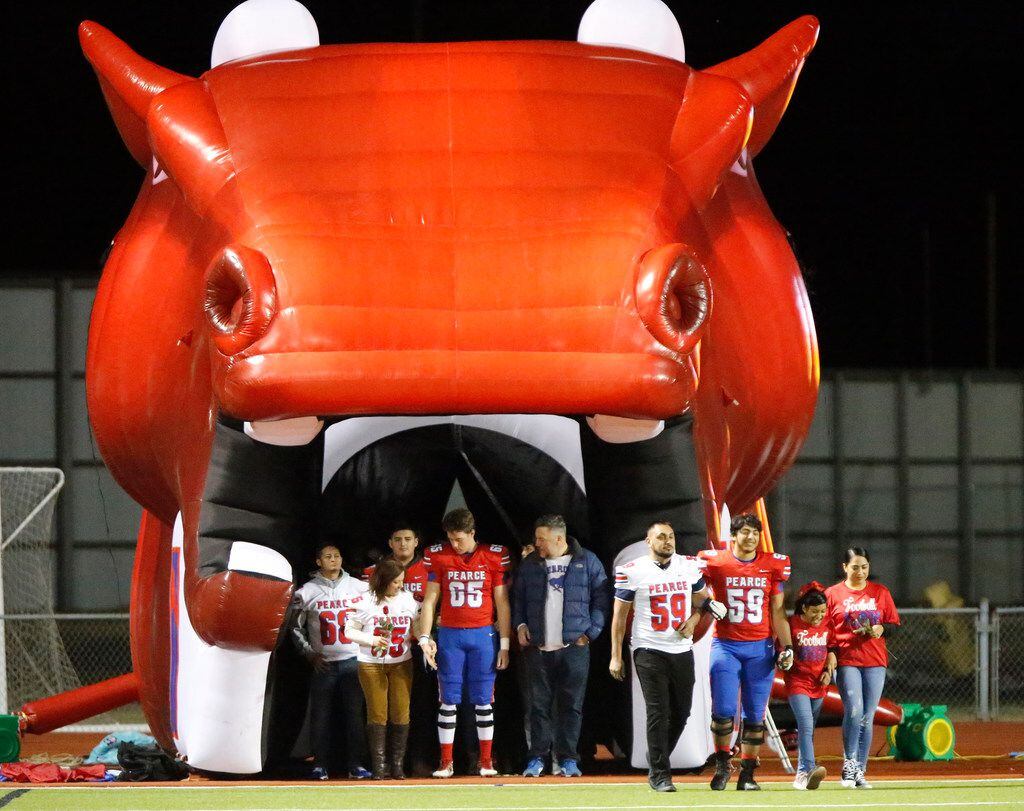 J.J. Pearce High School honored their senior players and their families before kickoff as...