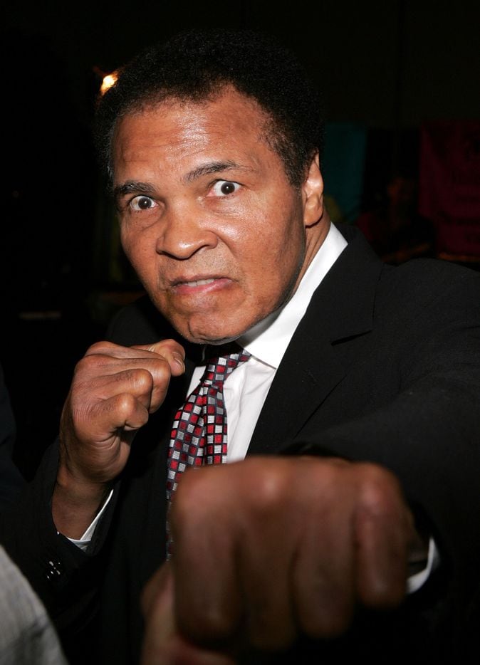 Former Boxer Muhammad Ali poses as he attends the Grand Gala Hilton VIP reception held at...