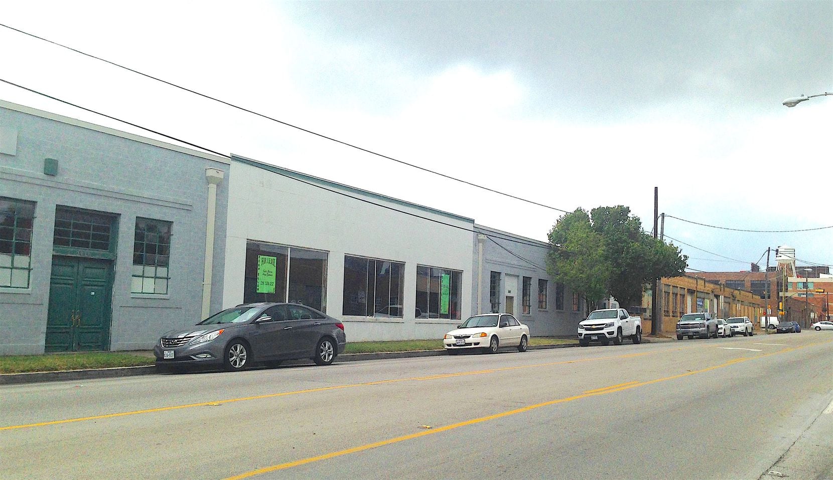 The mixed-use project will replace a strip of old commercial and industrial buildings along...