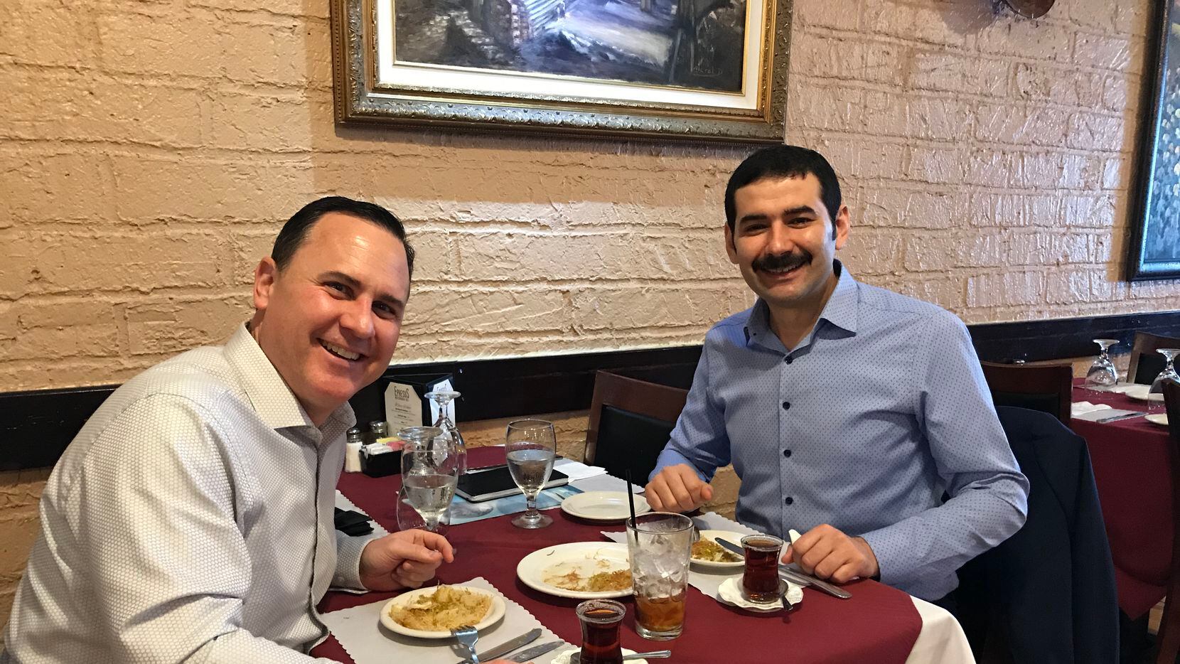 Columnists Andy Stoker (left) and Huseyin Peker share a meal.