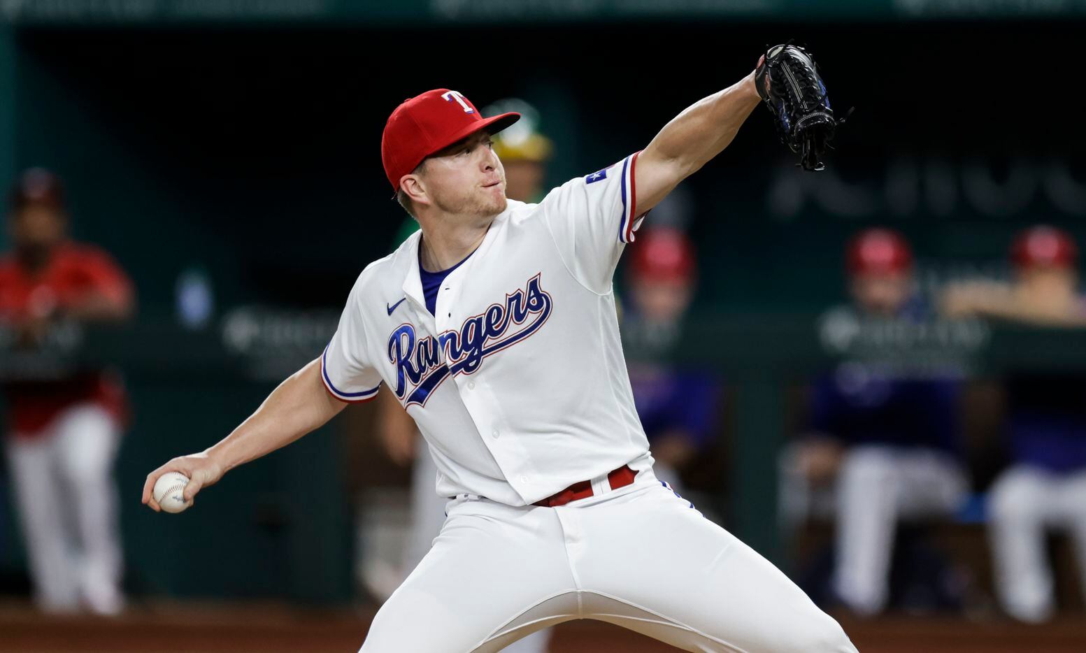 Texas Rangers relief pitcher Josh Sborz throws during the sixth inning of a baseball game...