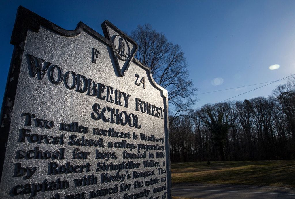 A historical marker stands at the entrance to Woodberry Forest School, an all-boys private...