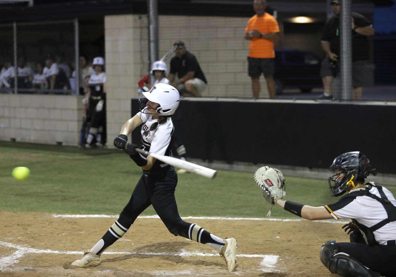 The Colony High School #7, Sabrina Wick, swings for the ball during a softball game against...