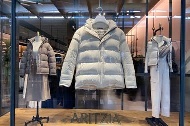 An Artizia window at NorthPark Center this past winter featured a comically large puffer...