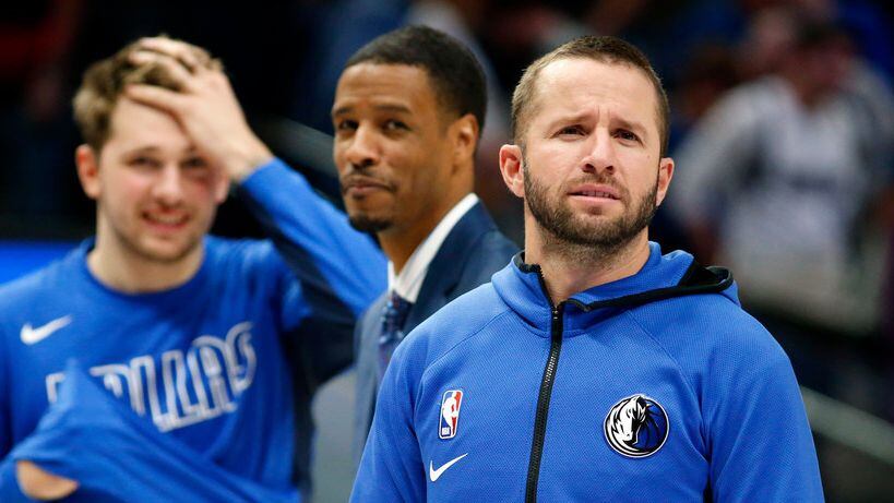 Dallas Mavericks guard J.J. Barea looks to someone he knows in the stands during a fourth...