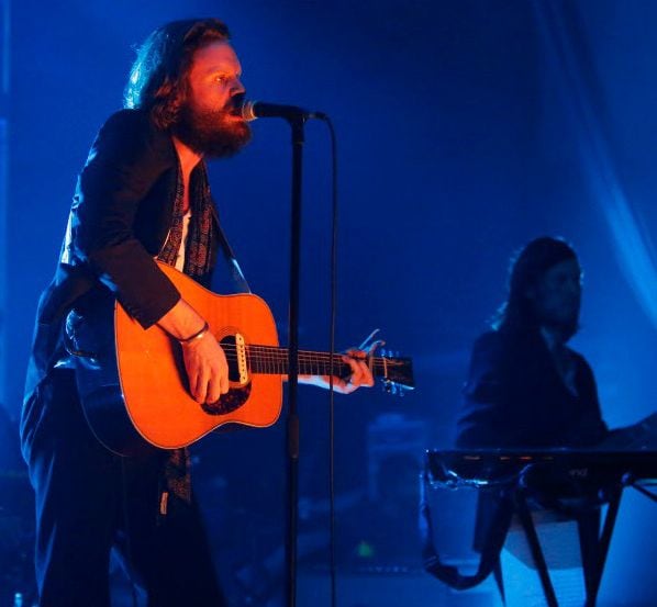Father John Misty frontman Joshua Tillman, left, performs with his band at the Granada...