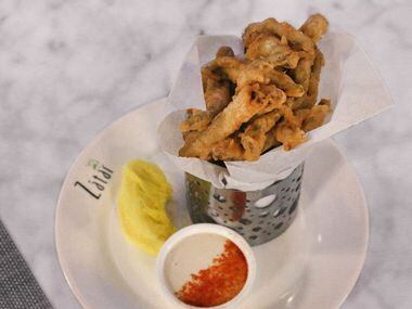 Fried smelts with tahini sauce