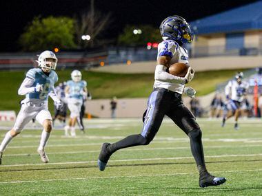 Dallas Christian wide receiver William Nettles (3) strides into the end zone for a 76-yard...