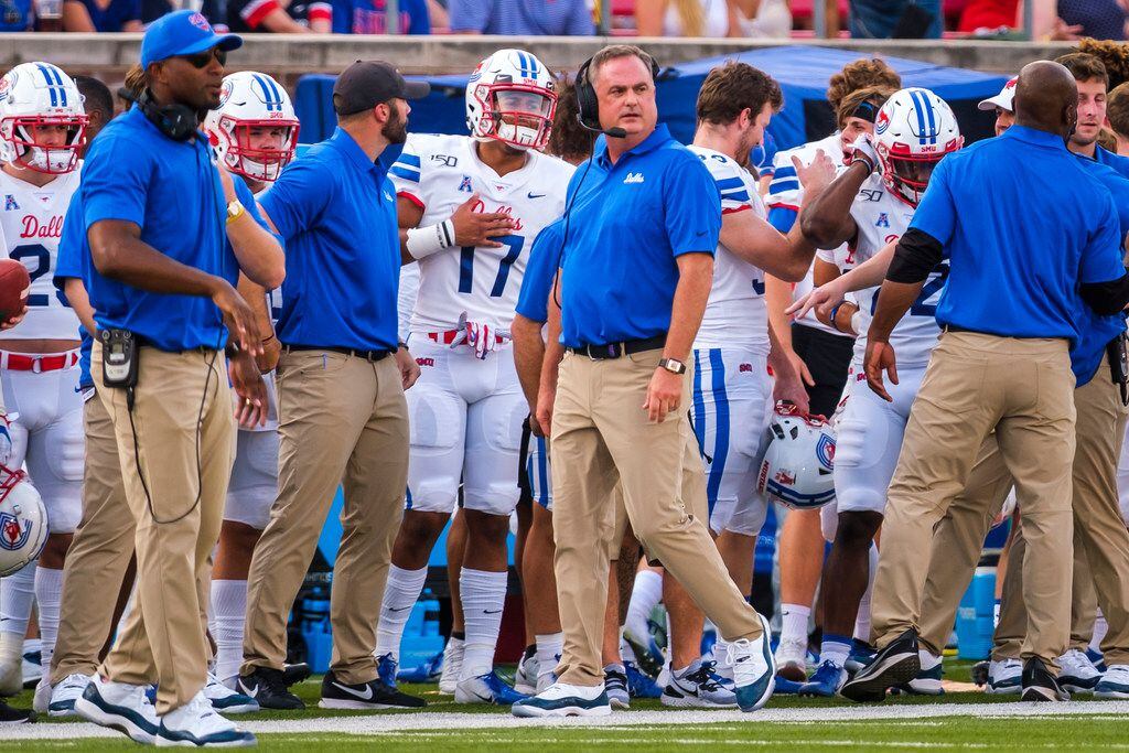SMU head coach Sonny Dykes paces the sidelines during the first half of an NCAA football...