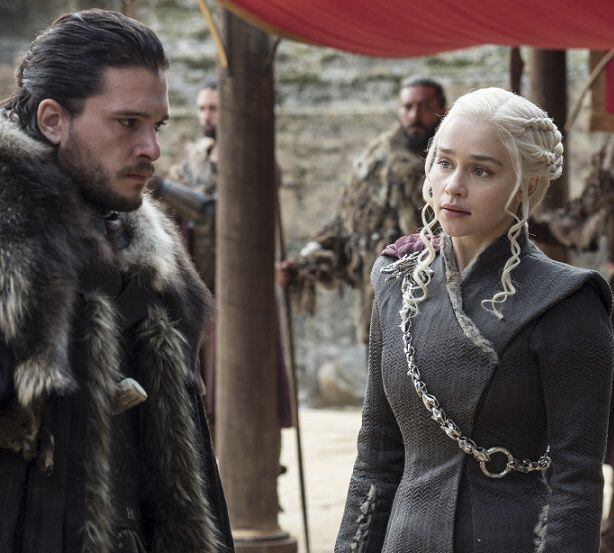 This image released by HBO shows Kit Harington, left, and Emilia Clarke on the season finale...
