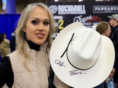 Rebecca Gutierrez shows off her cowboy hat with autographs from “Yellowstone” creator Taylor...