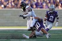 Southeast Missouri State wide receiver Ryan Flournoy (1) is tackled by Kansas State...