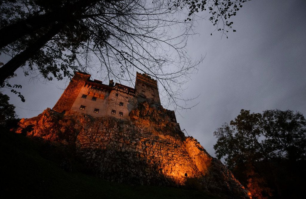 In this picture taken Oct. 9, 2016, Bran Castle lies on top of cliffs in Bran, Romania....