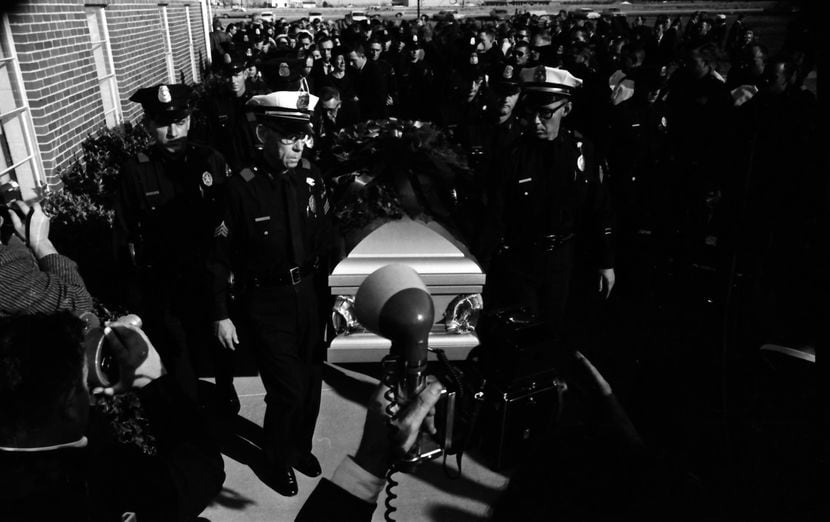 Officers held J.D. Tippit's casket at his funeral in 1963.