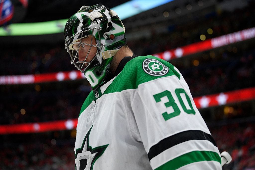 Dallas Stars goaltender Ben Bishop stands on the ice during a break in the action in the...