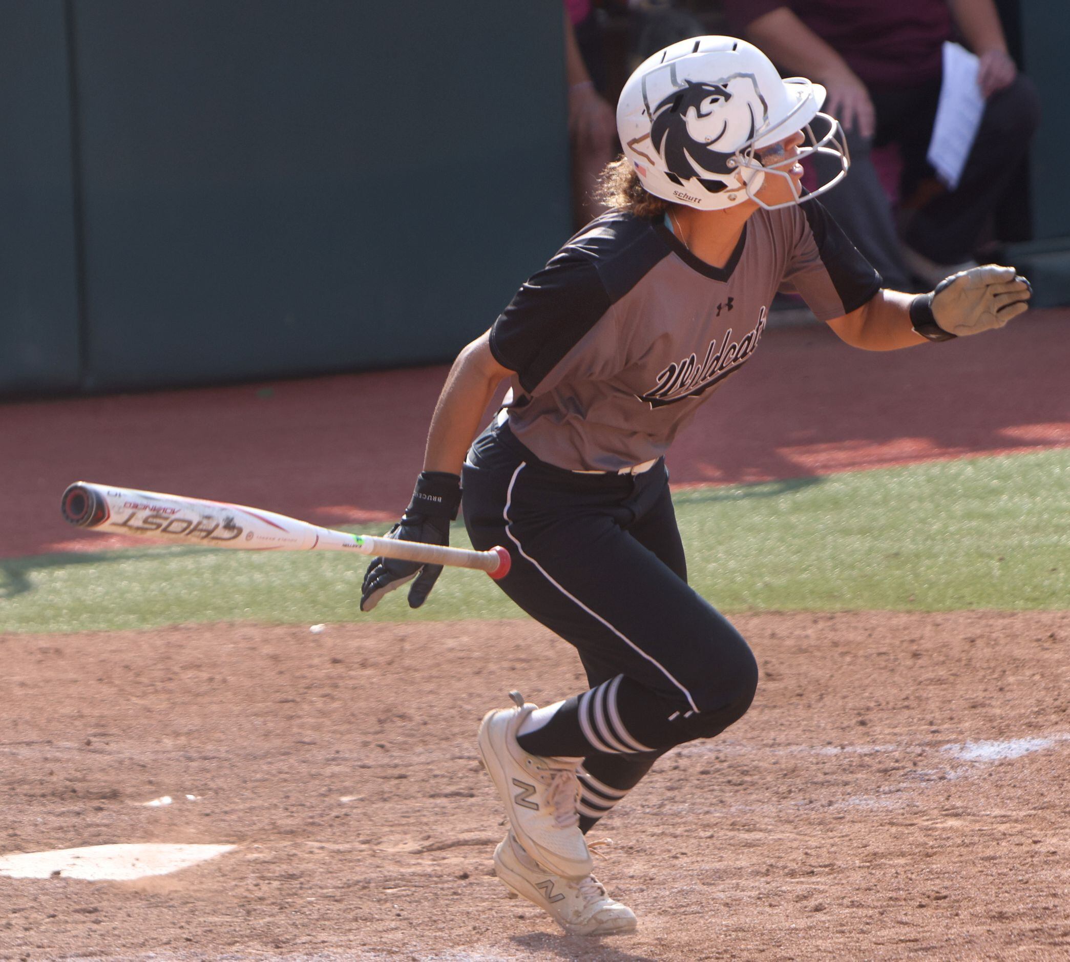 Denton Guyer's Tehya Pitts (7) watches as a long drive heads to the outfield while batting...