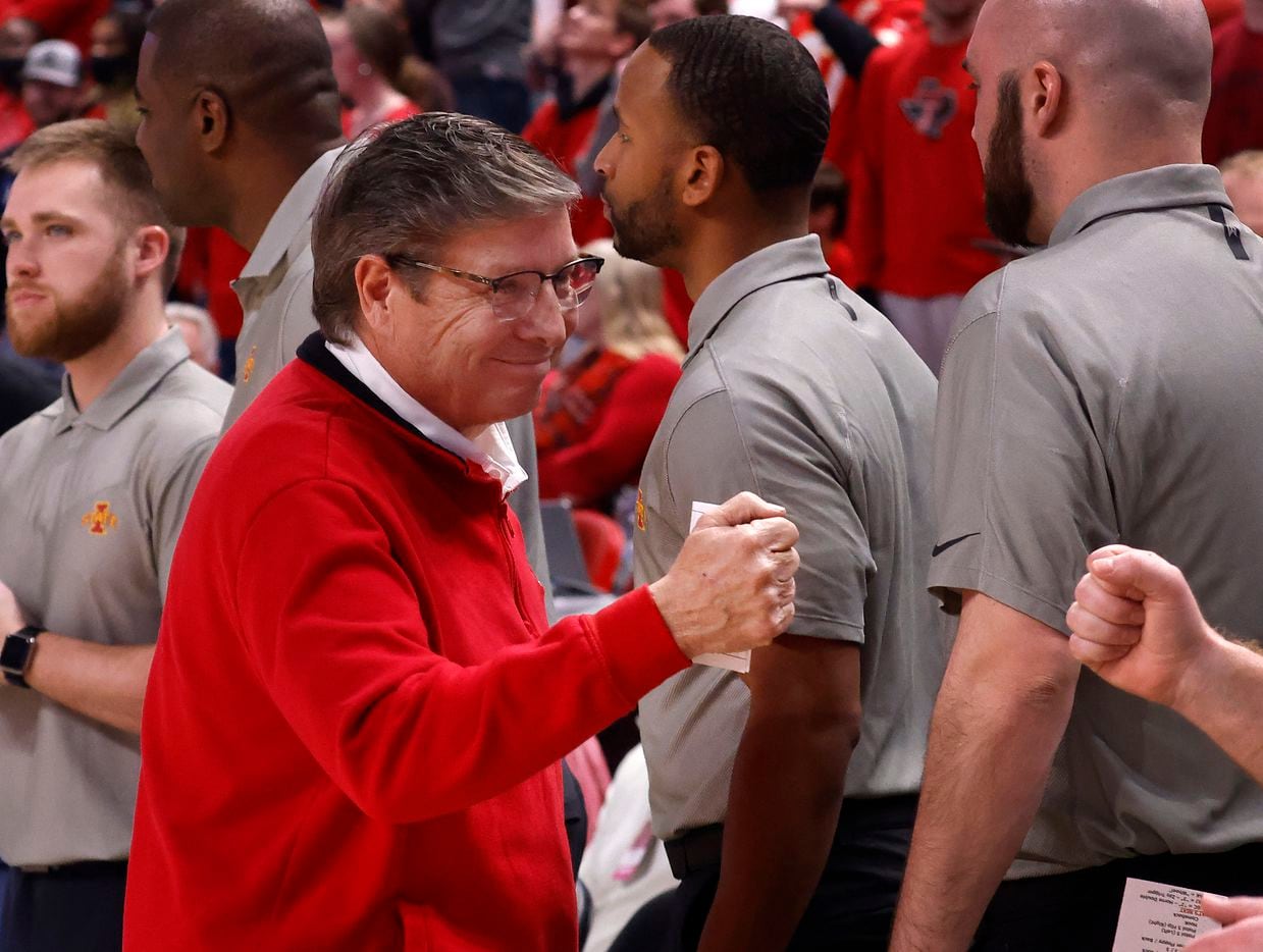 Texas Tech Red Raiders head coach Mark Adams (left) fist bumps members of the Iowa State...