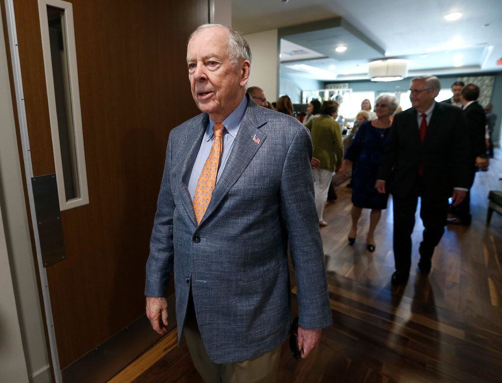 T. Boone Pickens leaves after a dedication ceremony at T. Boone Pickens Hospice and...