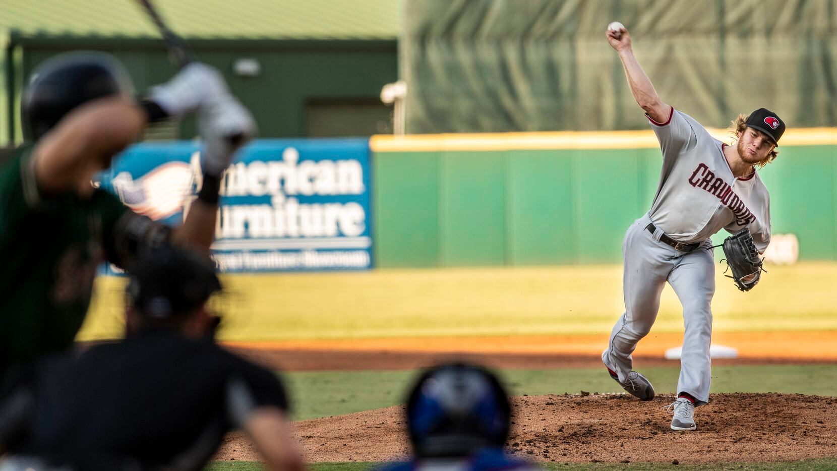Hickory Crawdad's pitcher Zak Kent (11) pitches against the Greensboro Grasshoppers at First...