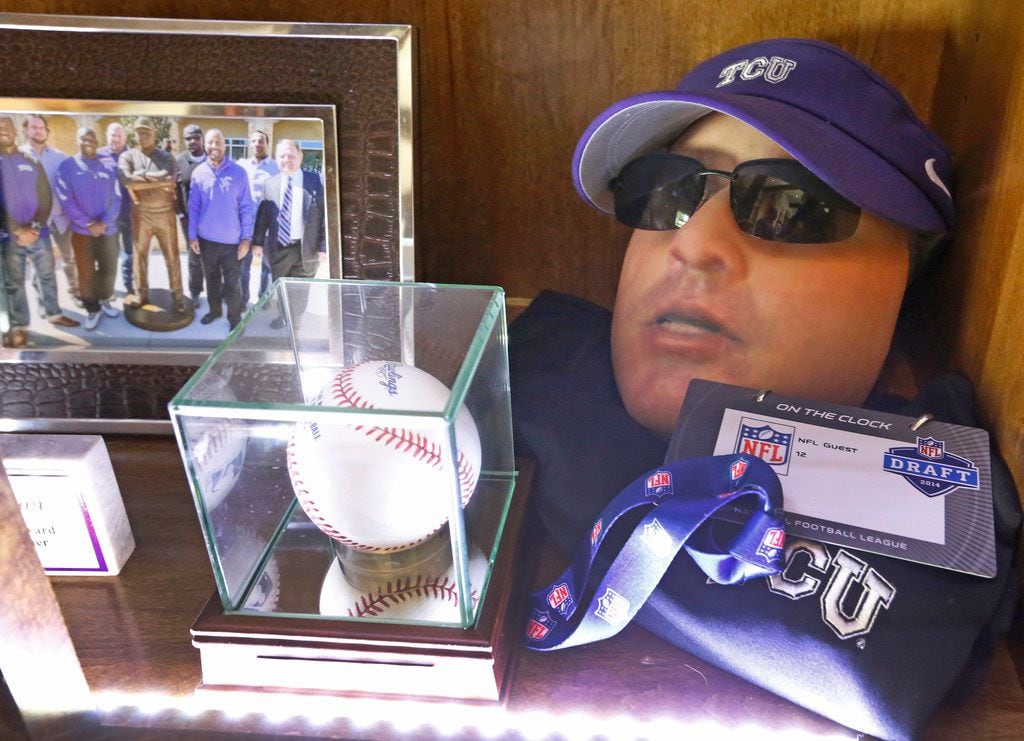 TCU head football coach Gary Patterson's memorabilia include a souvenir mask produced to resemble the Frogs' coach, pictured in his home office/recruiting room in Fort Worth, Texas on Wednesday, July 5, 2018. (Louis DeLuca/The Dallas Morning News)