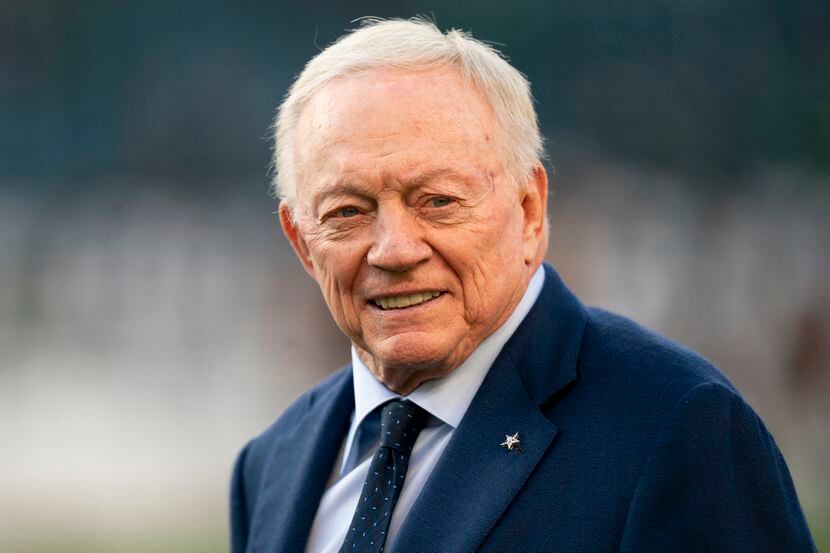 Dallas Cowboys owner Jerry Jones, left, looks on prior to the NFL football game against the...
