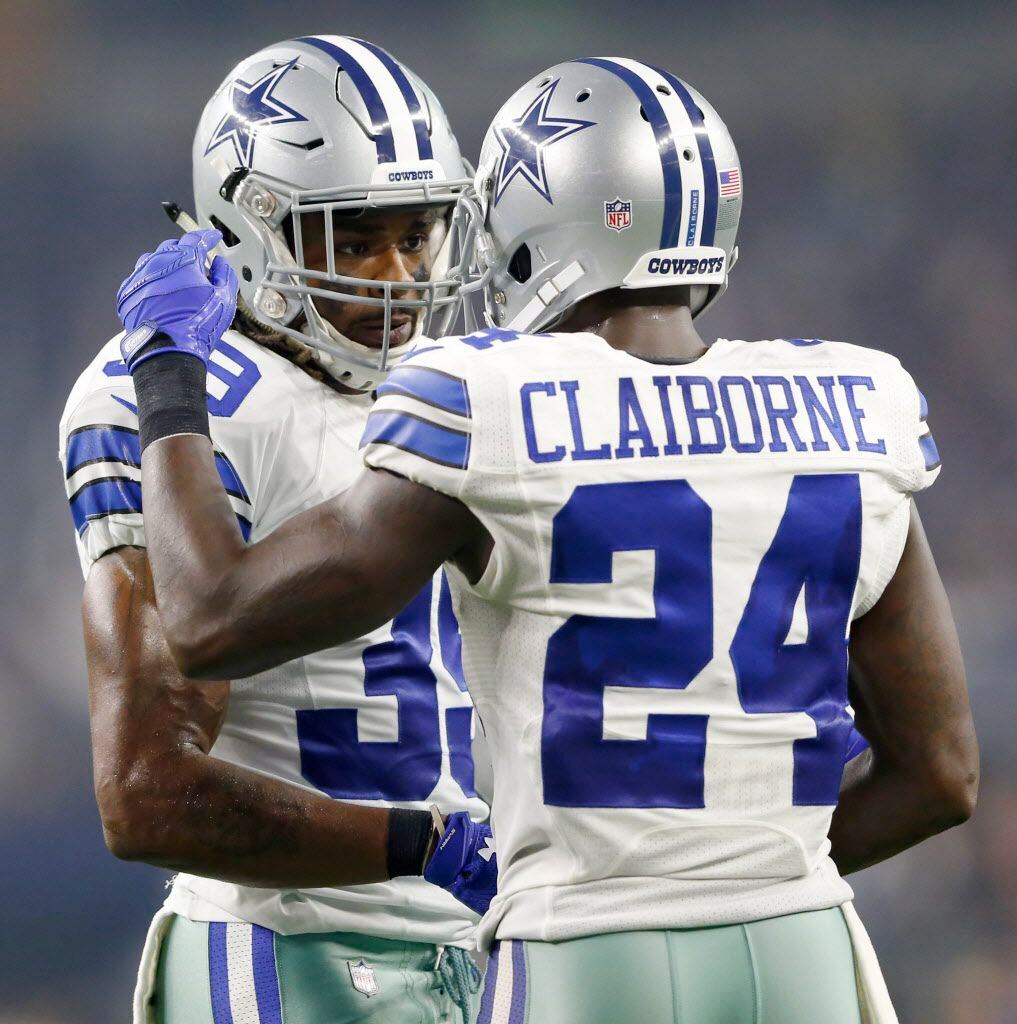 Dallas Cowboys cornerback Brandon Carr (39) and Dallas Cowboys cornerback Morris Claiborne (24) talk after a defensive stop during the second half of play at AT&T Stadium in Arlington on Sunday, September 25, 2016. (Vernon Bryant/The Dallas Morning News)