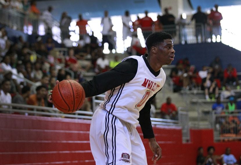 Mo Williams Academy AAU basketball player Emmanuel Mudiay (0) looks to drive against Dallas...