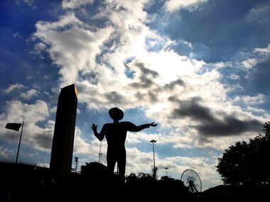 Big Tex is silhouetted against the early morning sky on October 17, 2012. 