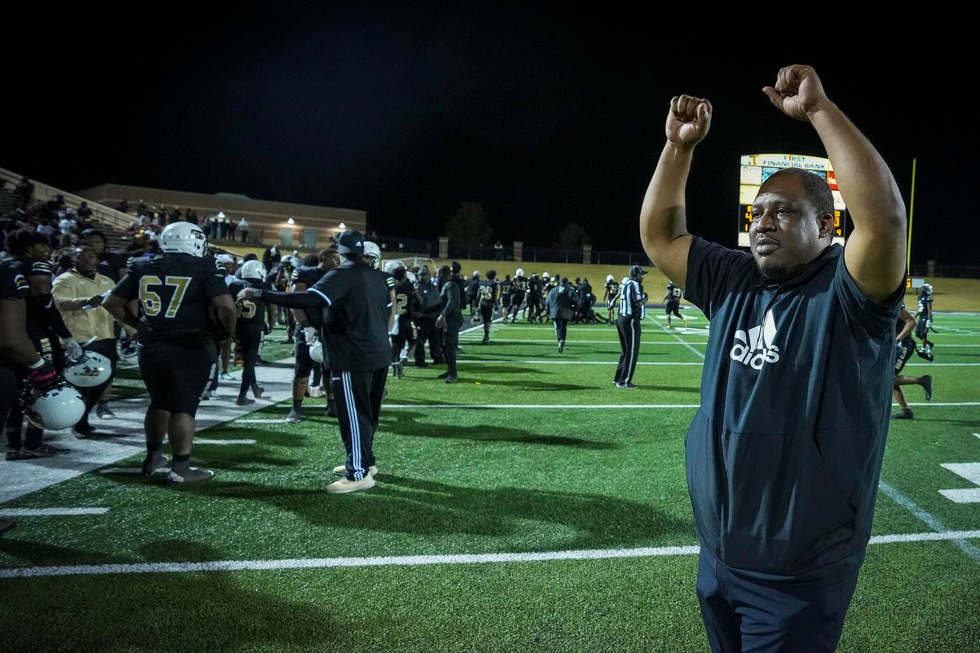 South Oak Cliff head coach Jason Todd celebrates in the final seconds  of the second half of...