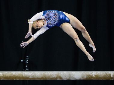 Alyssa Baumann of the University of Florida competes on the balance beam at the meet held at...