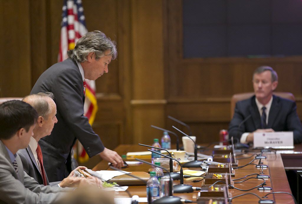 University of Texas Regent Wallace Hall (left, standing) sued UT System Chancellor Bill McRaven (right) for access to student admissions records he's been seeking to review for years.  (File 2015/Austin American-Statesman)