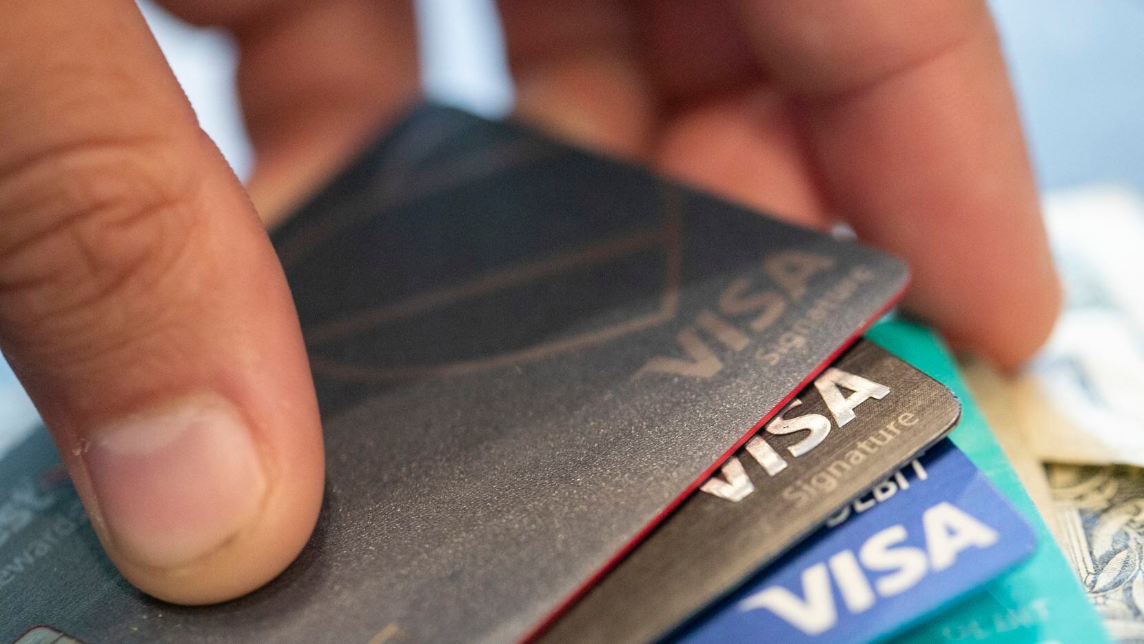 FILE - This Aug. 11, 2019 file photo shows Visa credit cards in New Orleans. Even if your...