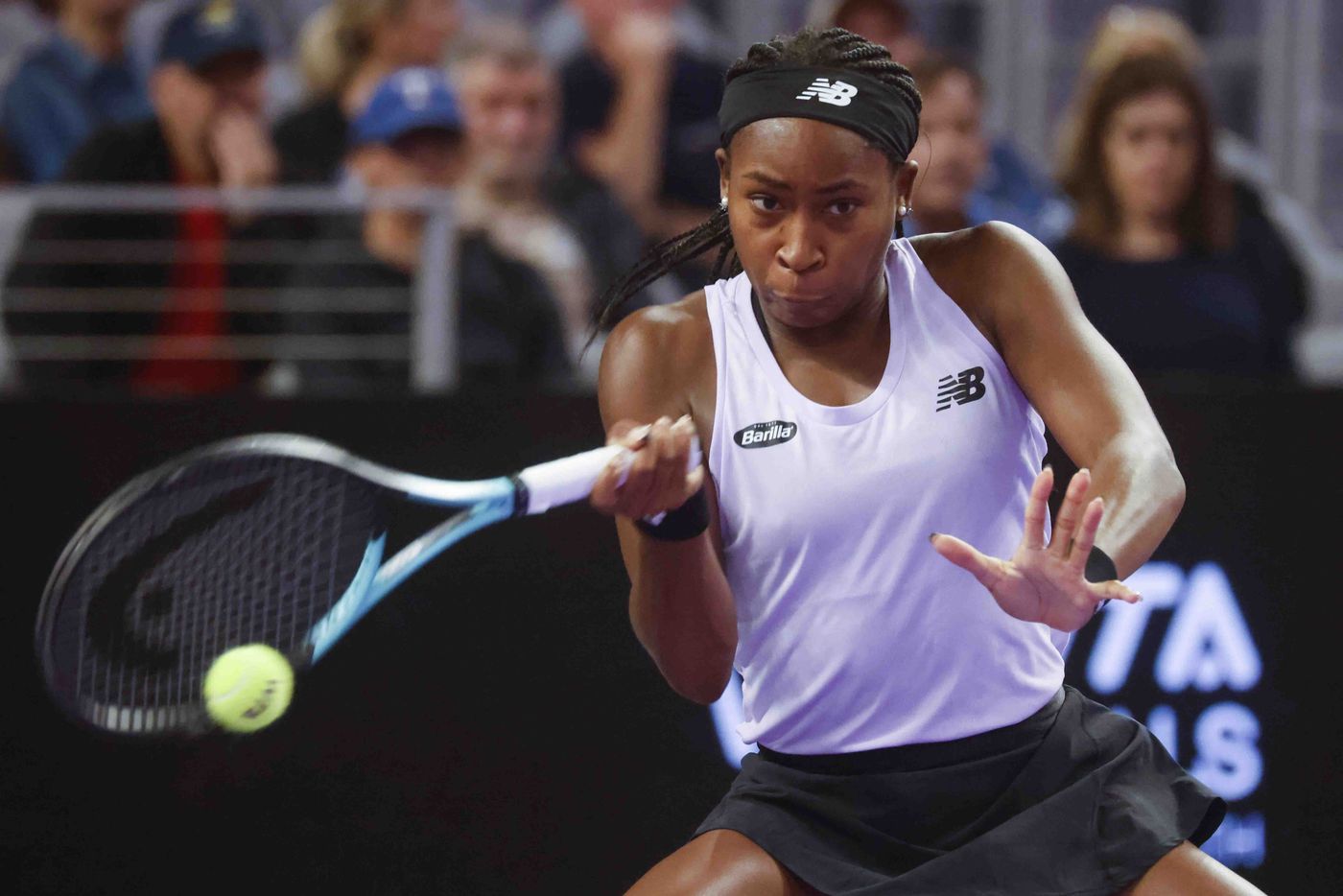 Coco Gauff of the USA returns a shot against Caroline Garcia of France on day two of the WTA...