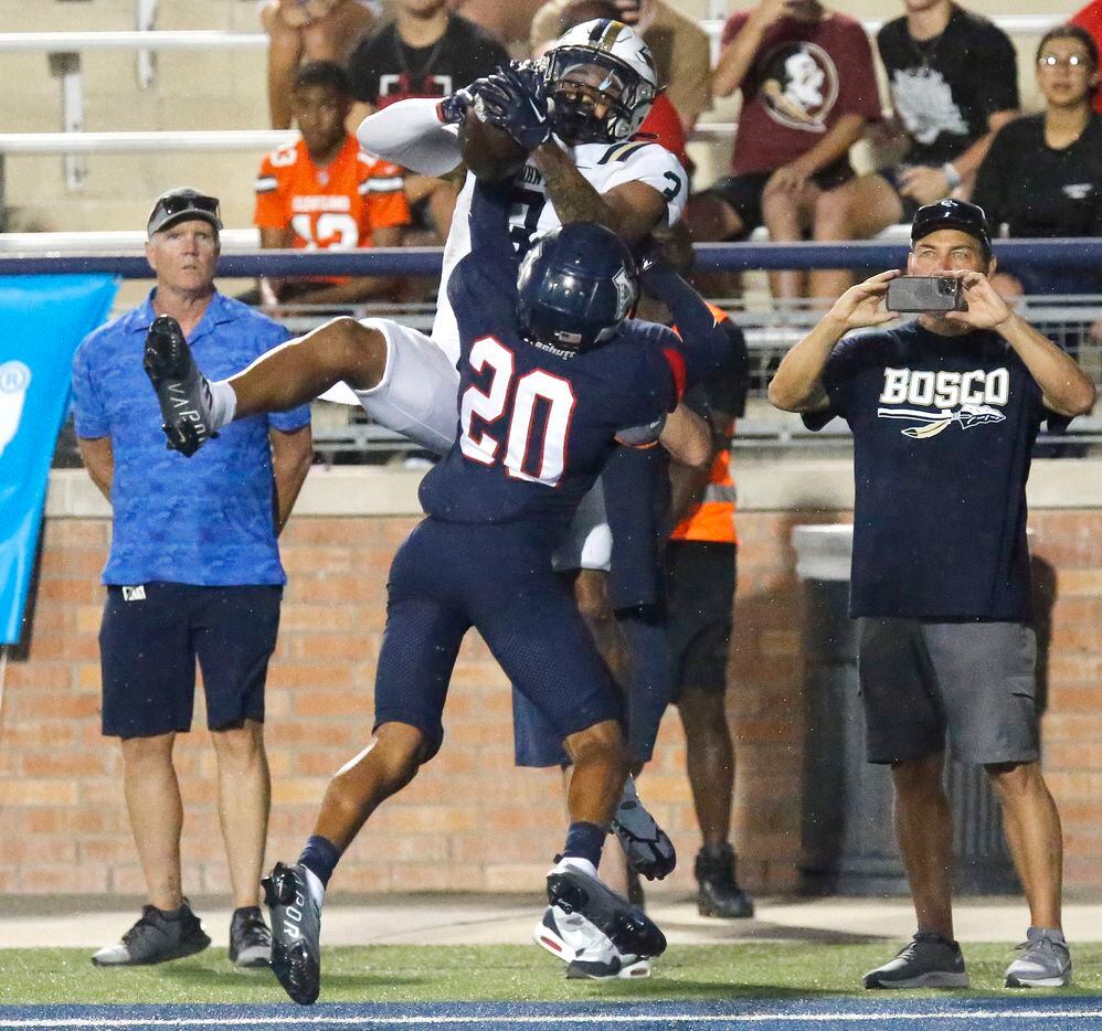 St. John Bosco High School wide receiver DeAndre Moore (3) was ruled out of bounds on the...