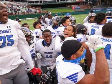 Mansfield Summit players celebrate after their Class 5A Division I Region I final win over...