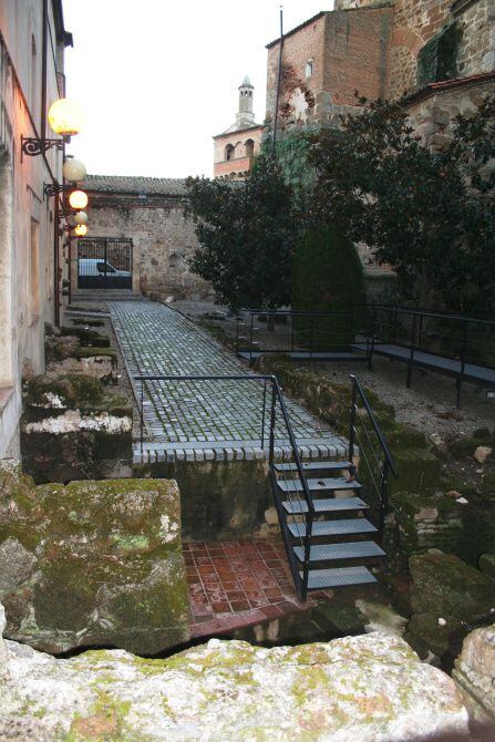 The ruins of a Jewish synagogue lie just outside guest rooms at the parador of Plasencia.