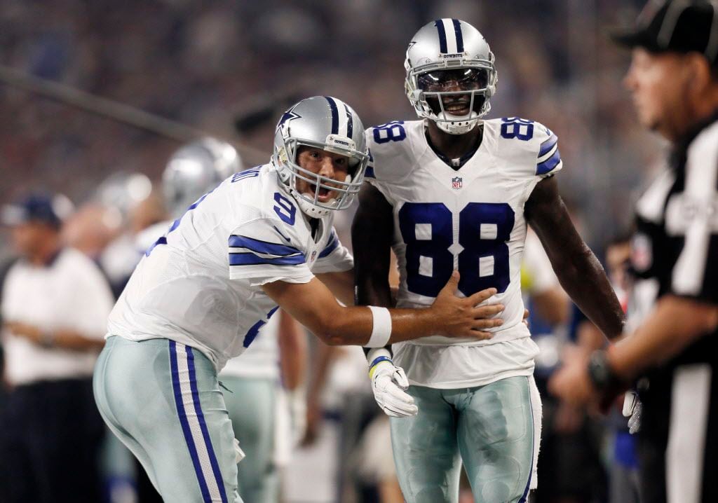 FILE - In this Sept. 13, 2015, file photo, Dallas Cowboys quarterback Tony Romo (9) and wide...