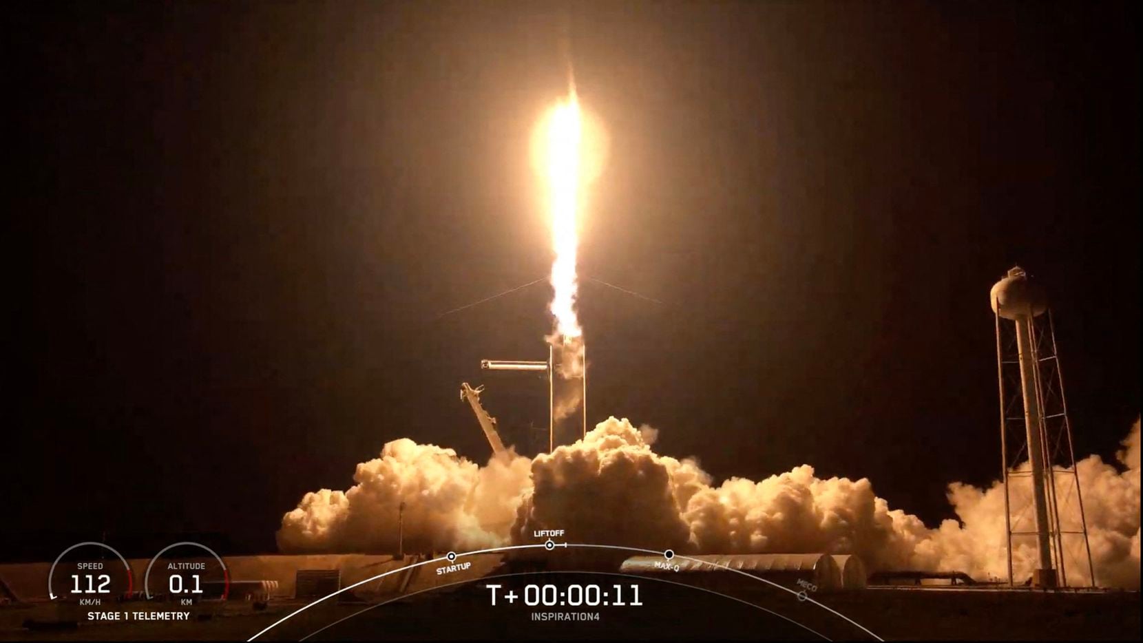 This screengrab taken from the SpaceX live webcast shows a SpaceX Falcon 9 rocket carrying...