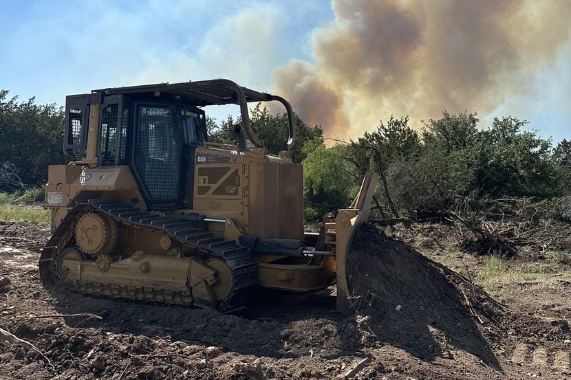 A wildfire in Palo Pinto County grew past its containment Friday after authorities contained...