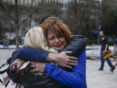 Supporters react after learning that Democratic presidential candidate Pete Buttigieg was ending his campaign less than an hour before a rally on Sunday, March 1, 2020 at Main Street Garden Park in downtown Dallas.