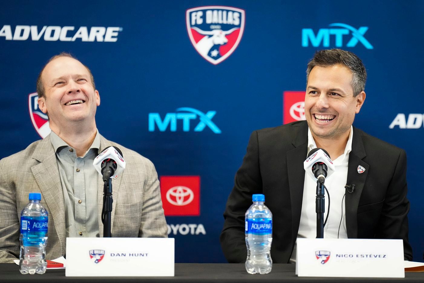 New FC Dallas head coach Nico Estévez (right) laughs with FC Dallas president Dan Hunt during his introductory press conference at the National Soccer Hall of Fame on Friday, Dec. 3, 2021, in Frisco, Texas.