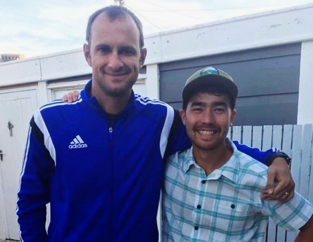 In this October 2018 photo, American John Allen Chau (right) stands for a photograph with...