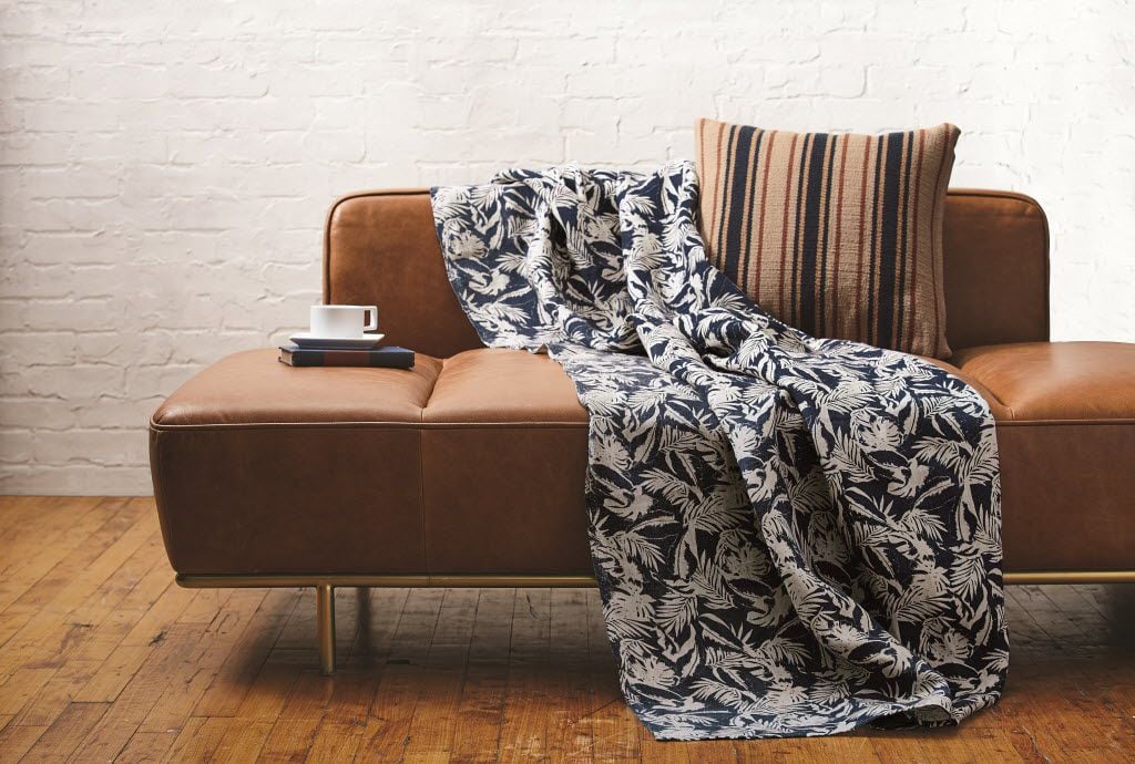 The cover photo for CB2's January catalog featured the Hill-Side collection, part of a...
