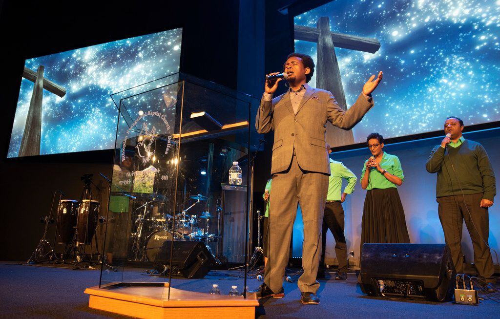 Daniel Amdemichael, worship director at Ethiopian Evangelical Baptist Church, sings during a...